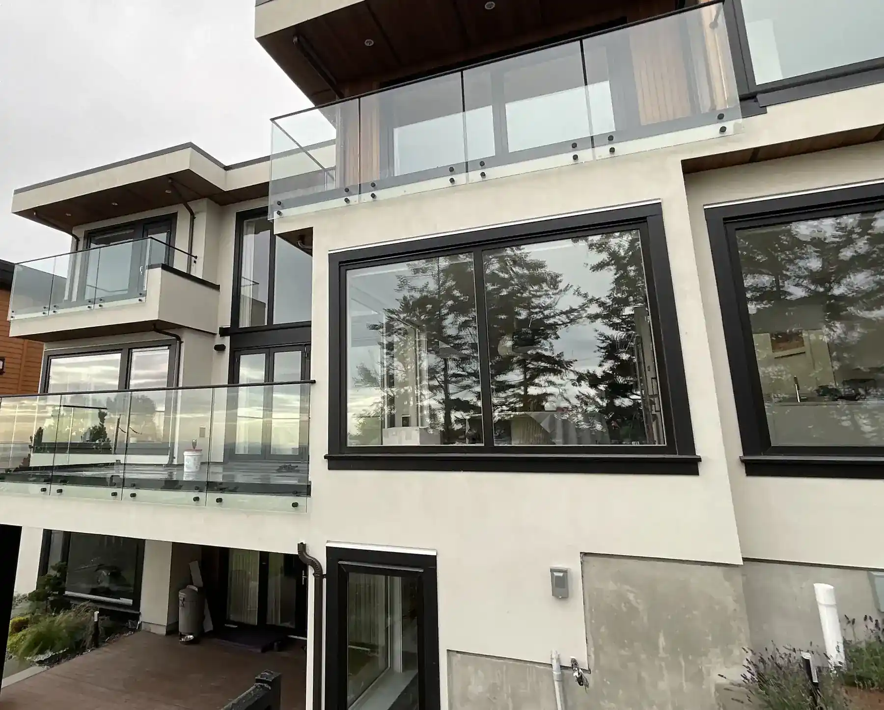 Large double-glazed sealed units in a modern home elevation, installed by Alpha Glass Ltd in Greater Vancouver
