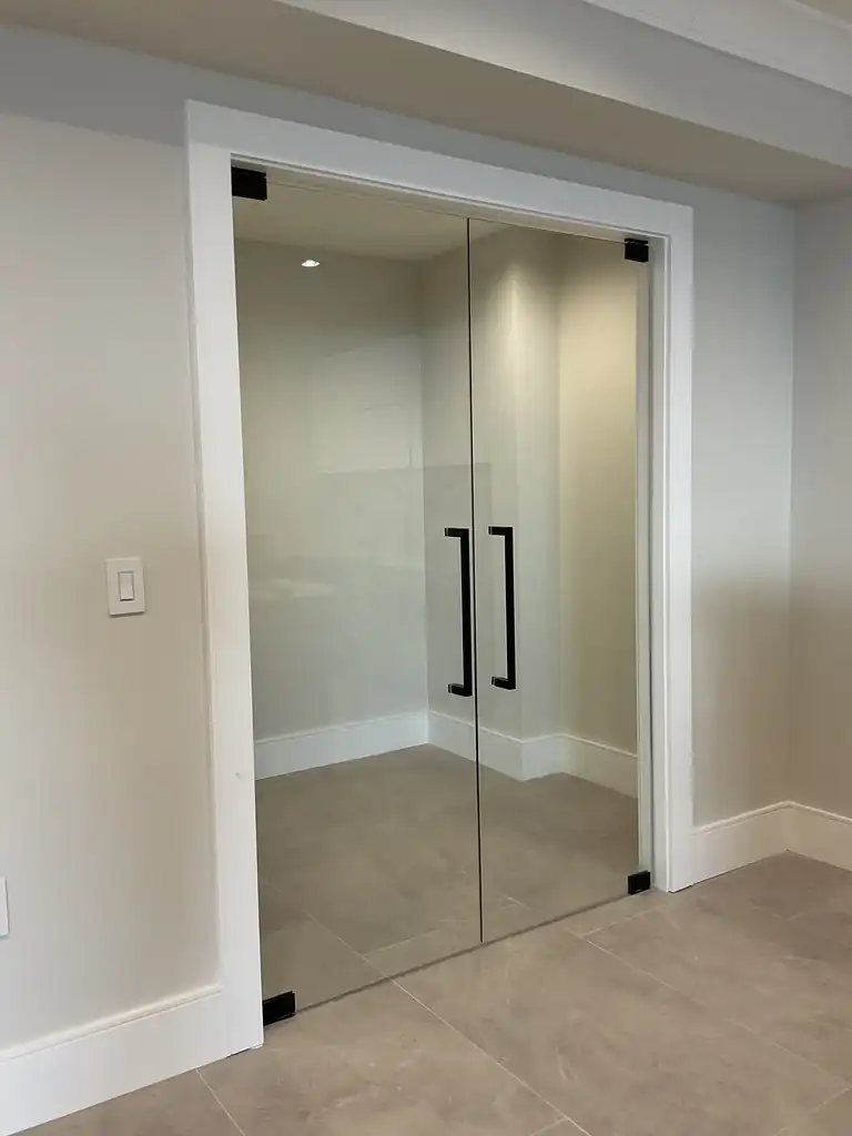 Glass patch doors installed by Alpha Glass Ltd in Greater Vancouver