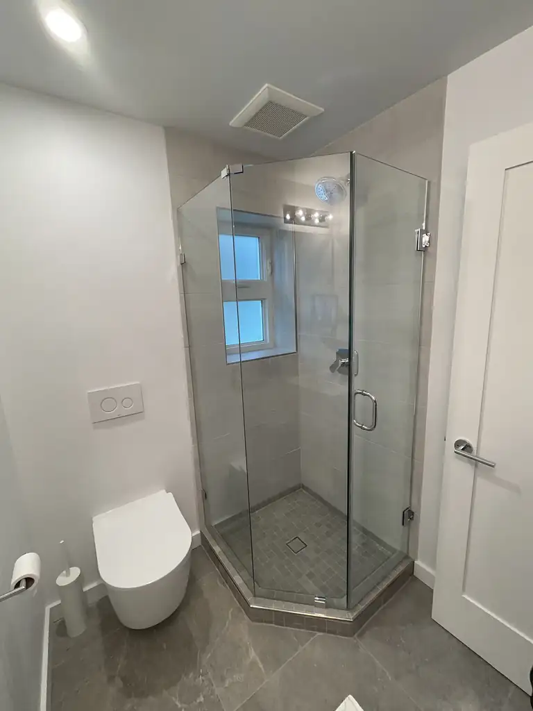 Frameless pivot shower door by Alpha Glass Ltd, project photo 2
