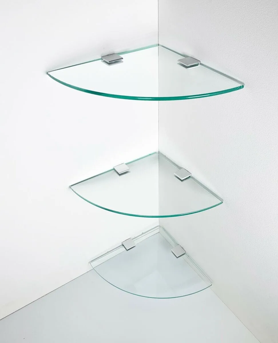 Three tempered glass corner shelves mounted in a white shower corner