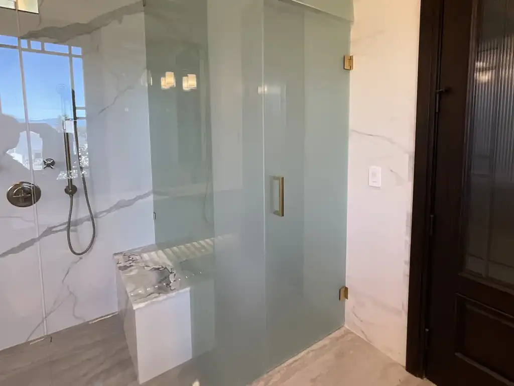 Walk-in shower with smart film glass switched to opaque for privacy