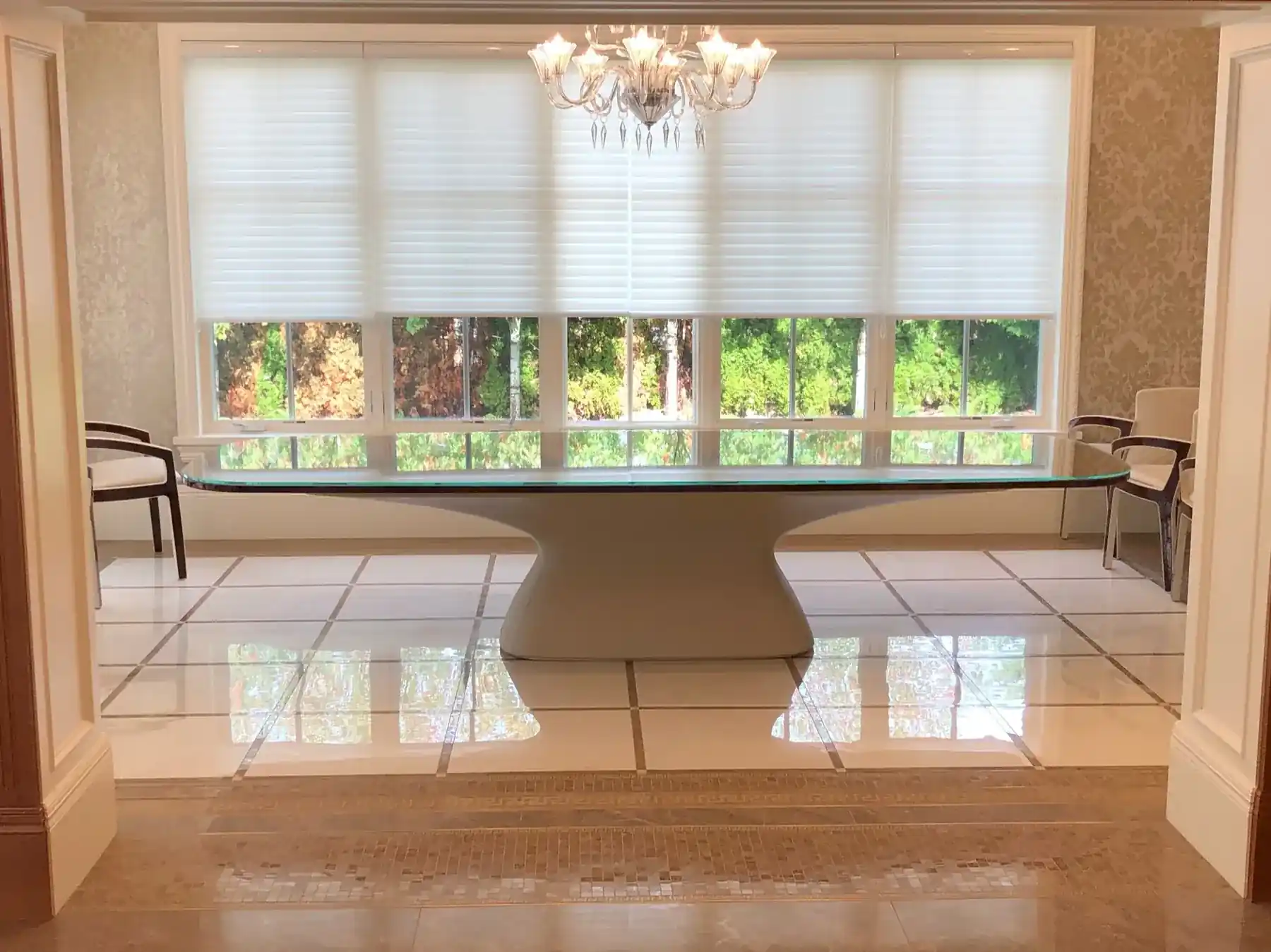 White-framed replacement windows across a dining room wall, supplied and fitted by Alpha Glass Ltd in Greater Vancouver